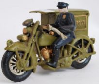 POST OFFICE FIGURE: A vintage style 20th century cast iron figure of a Post Office dispatch