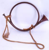 BUGLE: A decorative miliary original copper signal bugle, with original tassle rope.