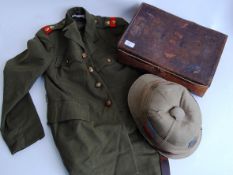 UNIFORM: An original vintage uniform belonging to an Officer Ethelstone - original jacket, belt,