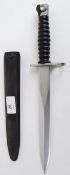 BAYONET: A 20th century Dutch Army bayonet dagger complete with composite scabbard.