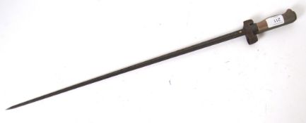 BAYONET: A late 19th century French Lebel bayonet with crossed blade, scabbard, and a brass handle.