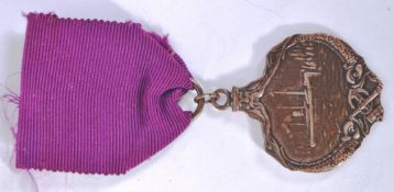RMS CARPATHIA: A believed reproduction Bronze Titanic disaster RMS Carpathia medal and ribbon.