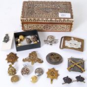 CAP BADGES: A good collection of military cap badges and other militaria - some WWI interest to