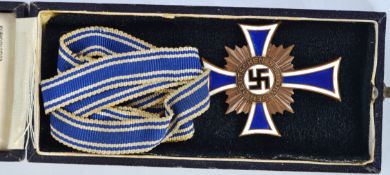 MOTHERS CROSS: An original rare bronze Mothers Cross Nazi German award medal.