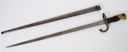 BAYONET: A c1886 French Gras military rifle bayonet. With scabbard, approx 64cm long.