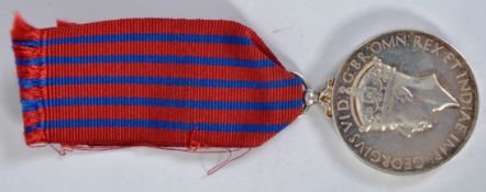 GEORGE MEDAL: A George Medal, likely silver but unmarked or untested. Lacking designers initials.