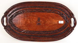 GURKHA TRAY: A late 19th / early 20th century colonial style carved hardwood tray - highly