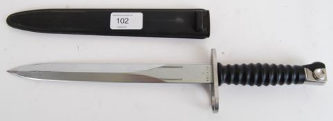 BAYONET: A 20th century Dutch Army bayonet dagger complete with composite scabbard.