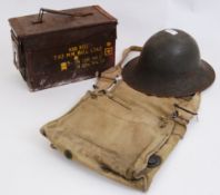 MILITARY MISC: A British military issue helmet dating to the First world war together with a