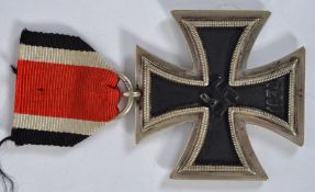 IRON CROSS: An original German Nazi issue Second Class Iron Cross. With numbered ring ' 24 '.