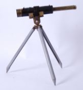 TELESCOPE: An interesting 19th century brass telescope and tripod,