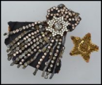 A large Victorian example of a paste work star burst motif with lead mounting having extensive