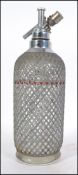 A retro / vintage 20th century continental Czech mesh covered soda syphon