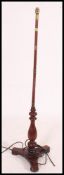 A late Victorian / Edwardian mahogany and brass bound standard lamp,