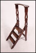 A Victorian mahogany 3 step library scissor ladder.