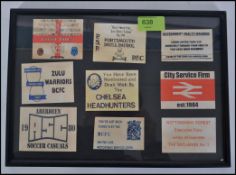 A collection of framed and glazed Football firm calling cards to include Bristol City, Leeds,