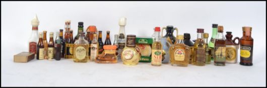 A massive collection of very collectible miniature drinks bottles with contents.