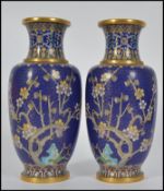 A pair of 20th century Chinese cloisonne enamel vases,