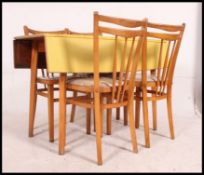 A retro 1960's large yellow formica and beech wood drop leaf kitchen diner dining table together