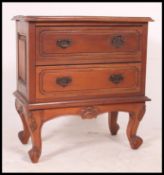 A Victorian style mahogany 2 drawers chest.