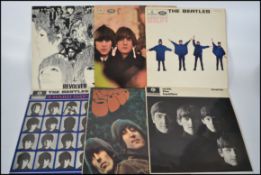 A collection six of The Beatles vinyl long play records to include Revolver, Beatles for Sale,