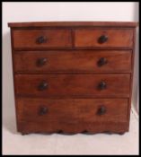A Victorian mahogany chest of drawers having 2 short over 3 deep configuration.