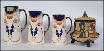A set of three Burleigh Staffordshire transfer printed graduating jugs with an Imari design along