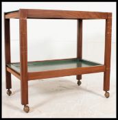 A vintage Danish influence / possibly Air Ministry teak and plastic butlers serving trolley.