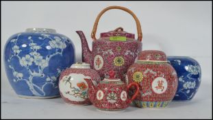A 20th century Japanese tea service consisting of a teapot, creamer,