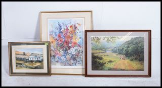 A framed and glazed water colour by Anita Skinner along with two framed and glazed prints,