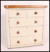 A painted Victorian two over three chest of drawers finished with a pine scrubbed top.