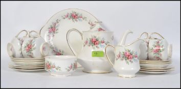 A 6 setting Royal Standard ' Rambling Rose ' pattern tea service. Makers marks to base.