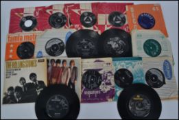 A small collection of 45 rpm vinyl singles and EP's from the 1960's to include The Rolling Stones '