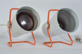 A pair of retro 1960's / 70's heat lamps,