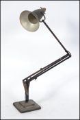 A 1940's Herbert Terry two step anglepoise Industrial desk lamp having square terraced base with