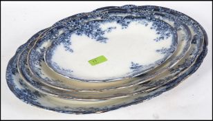 A set of four 19th century blue and white semi - porcelain Henry Alcock & Co graduating meat