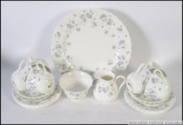 A chintzy bone china tea service from Wedgwood in the ' April Flowers ' service,