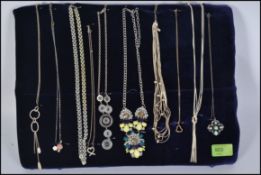A group of ten costume jewellery necklaces to include 925 silver examples (please see images)