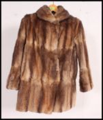 A vintage 3/4 hip length dark brown fur coat,