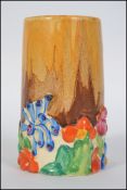 An early 20th century Clarice Cliff Bizarre pattern hand painted ' My Garden ' floral vase.