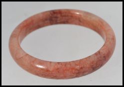 A Chinese 20th century jade bangle,