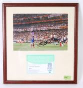 ZINEDINE ZEDANE: An original signed autographed photograph of Zinedine Zedane.