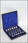 A cased set of silver hallmarked apostle teaspoons complete in the original velvet lined case.