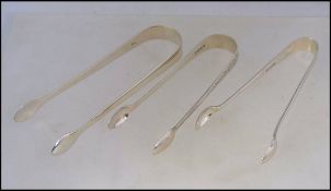 A collection of 3 silver hallmarked sugar tongs to include John Round & Sons, Sheffield 1911,