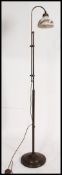 A good quality telescopic brass standard lamp having brass stand with base and decorative painted