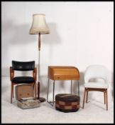 A retro 1950's childs school desk together with a dansette leg coffee table, teak standard lamp,