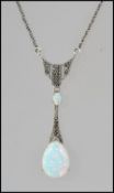 A 20th century Art Nouveau ladies silver and opal set pendant and necklace,