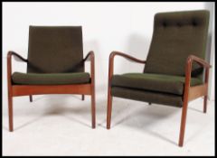 A 1970's original pair of teak Danish influence armchairs in the manner of Scandart.
