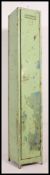 A mid century Industrial metal painted single locker having full length door with vented top and