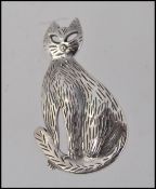 A 20th century ladies silver brooch in the form of a cat. Total weight 5.